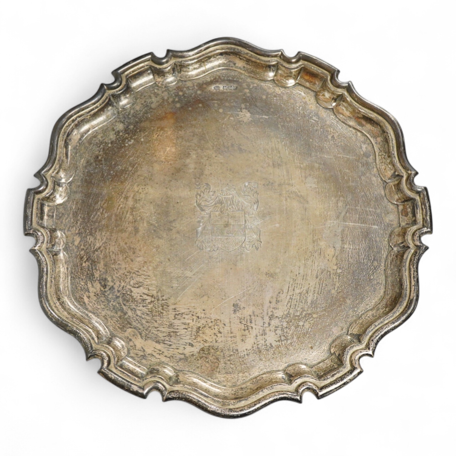 A George V silver circular salver with pie crust border and engraved armorial, by Alexander Clark Co. Ltd, Sheffield, 1922, 39.8cm, 49oz.